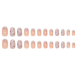 24-piece press-on nail set with nude pink gradient, stars, and red ribbon bow designs