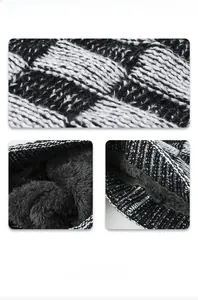 Detailed close-up of thick winter knit beanie with warm grey plush fleece lining