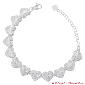 Detail of silver heart-shaped zircon link bracelet with lobster clasp and extension