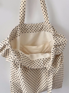 Minimalist polka dot canvas tote bag with black lace trim and spacious interior pocket