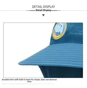 Detail of kids sun hat with cartoon crocodile patch and sturdy reinforced stitching
