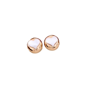 Minimalist gold heart stud earrings featuring a white heart inlay and polished metallic finish