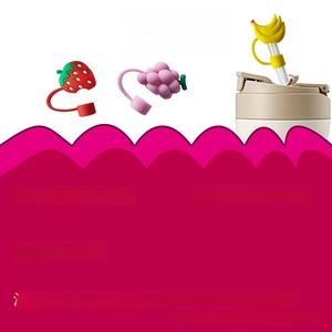 Detail of fruit silicone straw covers showing strawberry, grape, and banana designs