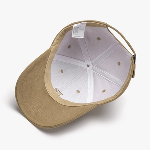 Inside view of khaki 100% cotton baseball cap with JHC brand label and 6-panel structure