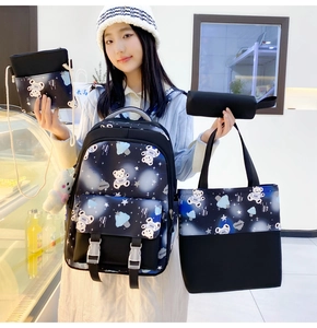 Detailed four-piece starry bear school backpack set including tote bag and pencil case