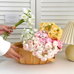 Artificial Ranunculus flower bouquet in a woven basket for home and wedding decoration