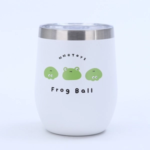 Close-up of a white 12oz stainless steel tumbler with a cute cartoon frog design