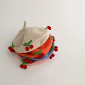 Cute knitted baby beret hat with cherry decoration in beige orange blue and pink