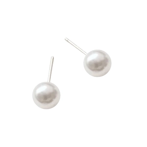 Classic round white pearl stud earrings with S925 sterling silver needles on white background