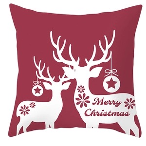 Red Christmas pillowcase with white reindeer silhouettes and Merry Christmas text design