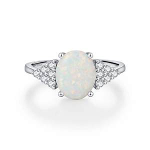 Elegant S925 sterling silver ring with oval white opal and side accent cubic zirconia stones