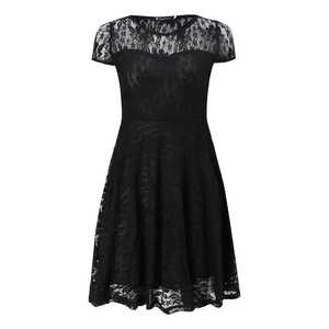 Detailed close-up of intricate black floral lace fabric and round neckline of a short dress