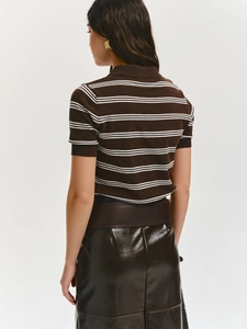 Slim fit brown and white striped knit polo shirt paired with a leather skirt back view