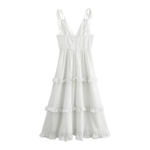 Robe midi vintage à pois blanche avec de fines bretelles et un col en V à volants