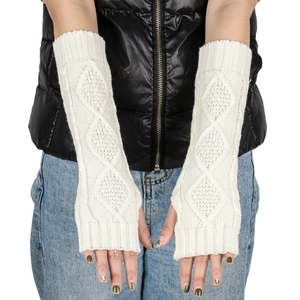 Detailed texture of beige long fingerless knitted gloves with diamond pattern