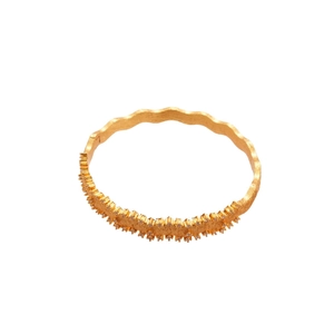 Elegant gold-plated wave ring with sparkling white zircon stones on white background