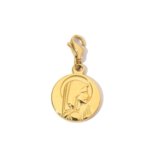Close-up of golden Tree of Life stainless steel pendant with Virgin Mary relief detail