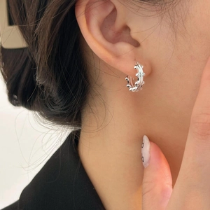 Minimalist 925 sterling silver bead hoop earring worn on model for a stylish look