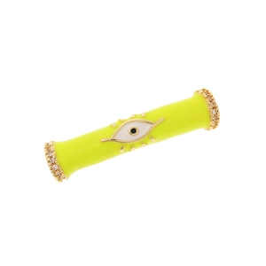 Macro detail of yellow enamel evil eye charm with gold trim and sparkling crystals