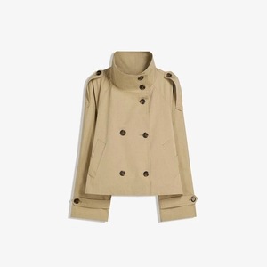 Detail shot of khaki double-breasted trench coat with epaulets and funnel neck collar