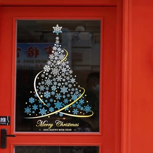 Christmas tree window sticker with snowflakes and gold Merry Christmas text on glass