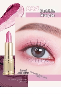 Close-up of dual-color shimmer eyeshadow stick in shade 03 Bubble Purple with eye makeup