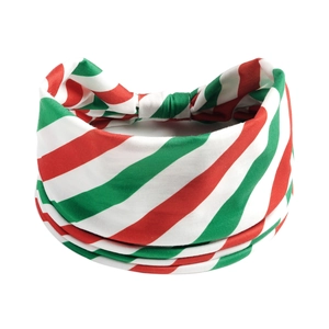Detail of a festive red, green and white striped fabric headband for Christmas yoga