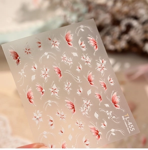 Macro detail of TL-455 nail art stickers featuring pink cherry blossoms and butterflies