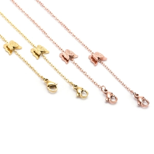 Double layered butterfly pendant chain in gold and rose gold titanium steel with lobster clasp