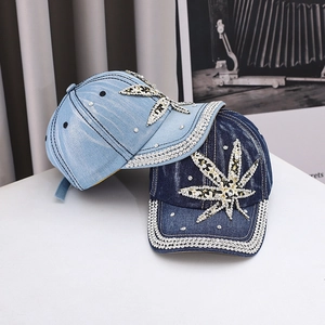 Denim baseball caps with rhinestone star patches in light and dark blue wash finishes
