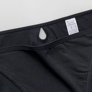 Women's black cotton sports bikini briefs with teardrop cutout and professional stitching