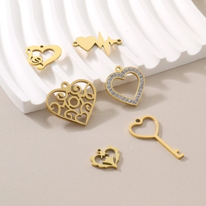 Ensemble de pendentifs cœur dorés avec note de musique, ECG, couronne et clé pour bijoux DIY