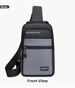 Front detail of gray and black oxford chest bag with vibrant yellow zipper pulls
