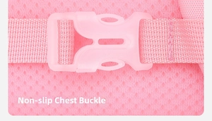 Detail of pink ergonomic non-slip chest buckle and breathable mesh on a school backpack