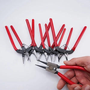 DIY jewelry pliers set with red non-slip handles for precision crafting and repair work