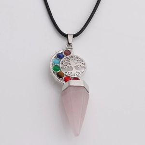 Detail of life tree silver pendant with seven chakra stones and pink crystal cone