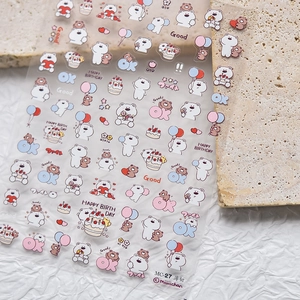 Detail shot of thin MC-27 cartoon bear nail stickers with balloons and cakes on stone