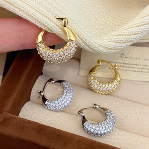 Elegant gold and silver hoop earrings with shimmering cubic zirconia micro-pave