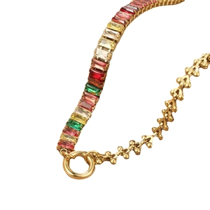 Elegant gold titanium necklace featuring five colorful rectangular zircons on a dotted chain
