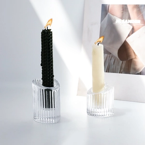 Minimalist ribbed heart-shaped crystal glass candle holders with modern striped texture