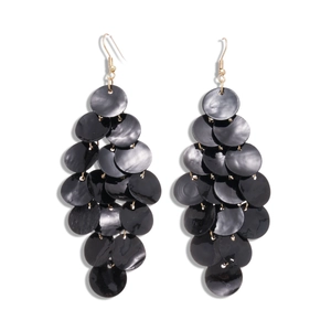 Gothic black shell disc tassel earrings with golden hooks on white background