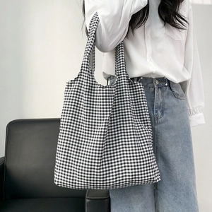 Minimalist black and white plaid canvas tote bag for women showing large capacity