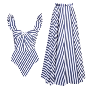 Blue and white striped ruffle one-piece swimsuit with matching high-waisted pleated maxi skirt