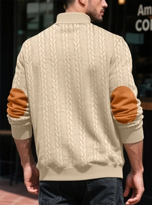 Detailed back view of a beige knit sweater featuring classic brown elbow patch accents