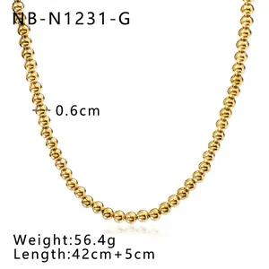 Detailed view of polished golden bead necklace with 0.6cm beads and high metallic luster