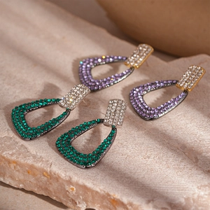 Retro geometric triangle earrings with sparkling crystals in green and purple stones