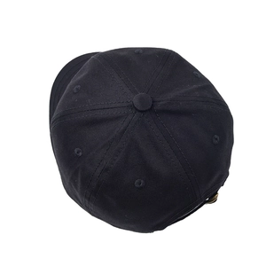 Top view of black baseball cap showing reinforced stitching and breathable eyelets