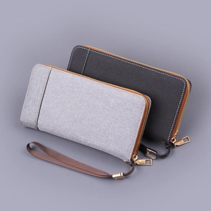 Pochette homme en toile avec dragonne et fermetures éclair en gris et noir élégant