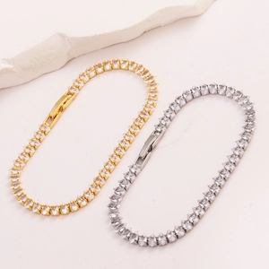 Elegante goldene und silberne Tennisarmbänder mit marquise Zirkonia im geknoteten Design