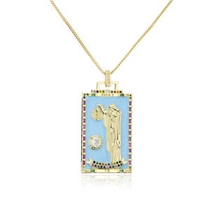 Macro detail of The Hermit tarot pendant with blue enamel and colorful zircon stones